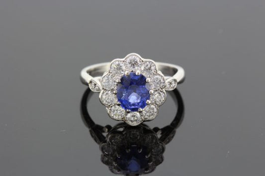 1.65ct Oval Cut Sapphire and Diamond Cluster Ring in Platinum