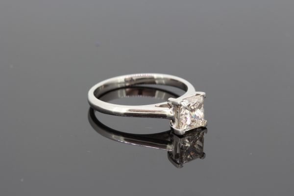 Princess Cut Diamond Solitaire Engagement Ring in Platinum; single stone diamond ring claw set with a 1.01 carat square-cut diamond