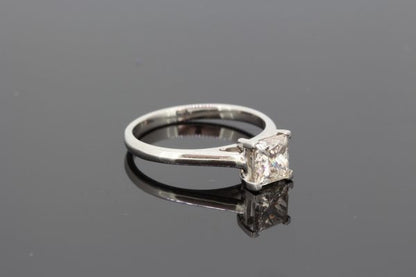 Princess Cut Diamond Solitaire Engagement Ring in Platinum; single stone diamond ring claw set with a 1.01 carat square-cut diamond