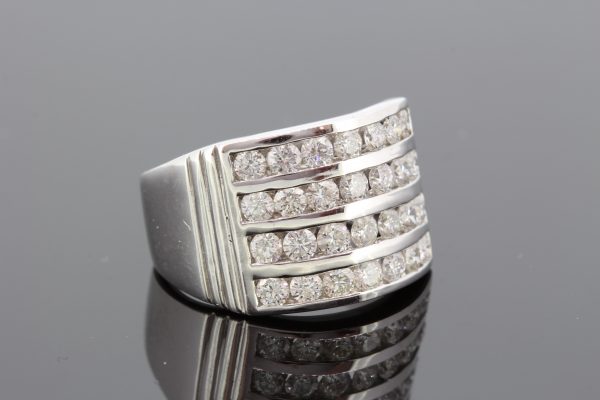 Channel Set Four Row Diamond Dress Ring; featuring round brilliant-cut diamonds all channel set into four rows, in 18ct white gold