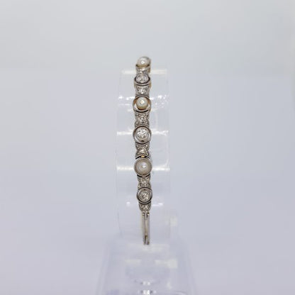 Antique Victorian Natural Pearl and Diamond Bracelet; elegant Victorian yellow gold bracelet set with natural pearls and sparkling diamonds