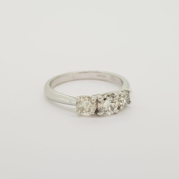 Diamond Three Stone Ring, 0.75 carat total, classic diamond trilogy ring featuring three round brilliant-cut diamonds claw-set in 18ct white gold