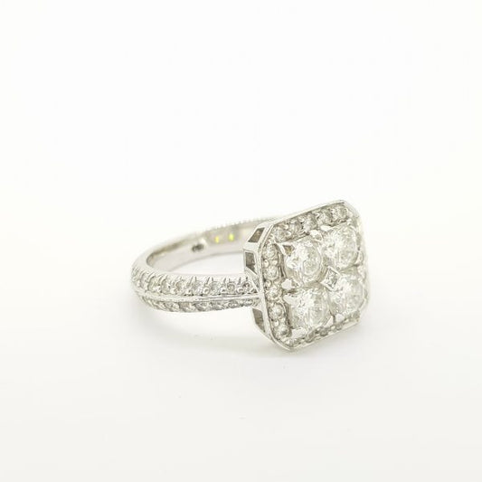 Contemporary Diamond Cluster Dress Ring, 1.20 carat total, central cluster of brilliant-cut diamonds encompassed within an outer diamond surround, in 18ct white gold