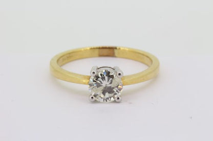 Classic Single Stone Diamond Solitaire Engagement Ring; 1ct round brilliant-cut diamond, four-claw set in 18ct white gold, mounted to an 18ct yellow gold band