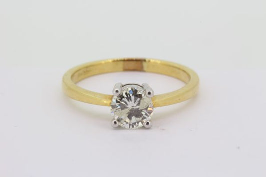 Classic Single Stone Diamond Solitaire Engagement Ring; 1ct round brilliant-cut diamond, four-claw set in 18ct white gold, mounted to an 18ct yellow gold band