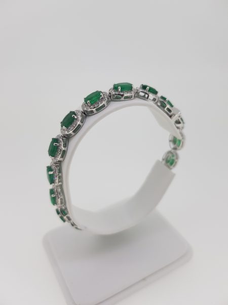 Emerald and Diamond Cluster Bracelet in 18ct white gold. Emeralds 13.00 carats. Diamonds 3.20 carats