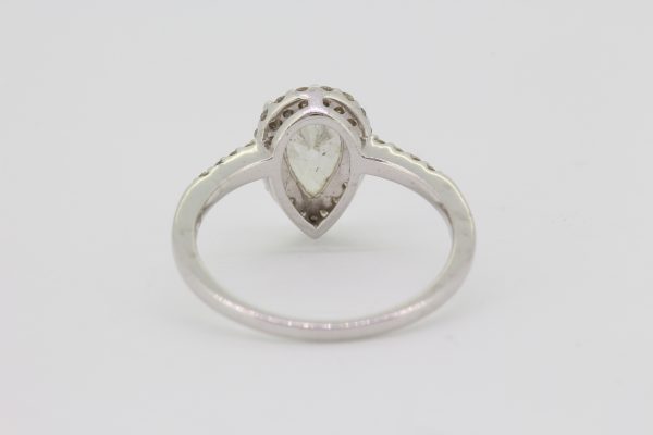 Pear Cut Diamond Cluster Ring; featuring a 1.04 carat pear-cut diamond with a 0.38ct brilliant-cut diamond surround, in 18ct white gold