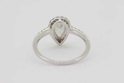 Pear Cut Diamond Cluster Ring; featuring a 1.04 carat pear-cut diamond with a 0.38ct brilliant-cut diamond surround, in 18ct white gold