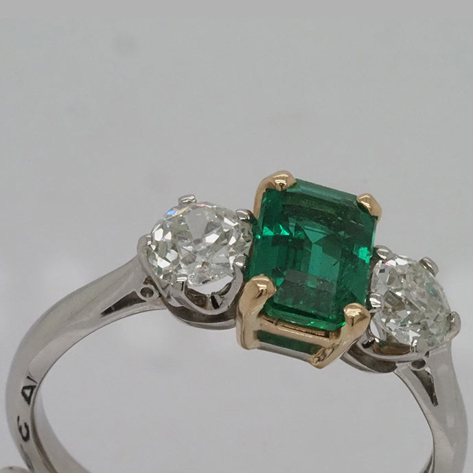 0.92ct Emerald and Diamond Three Stone Ring in Platinum
