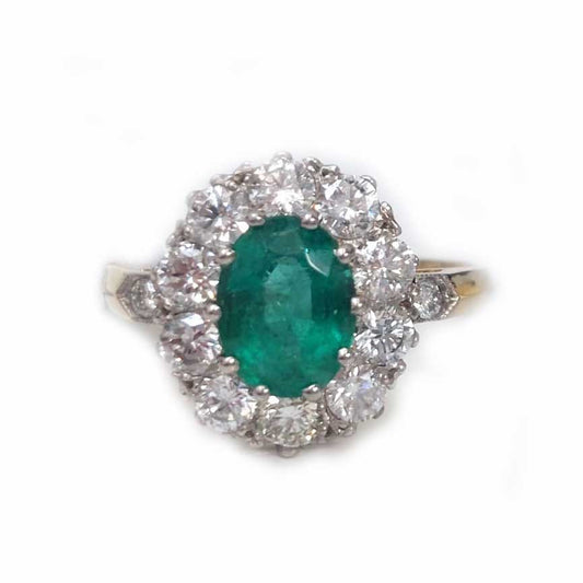 Emerald and diamond engagement ring cluster