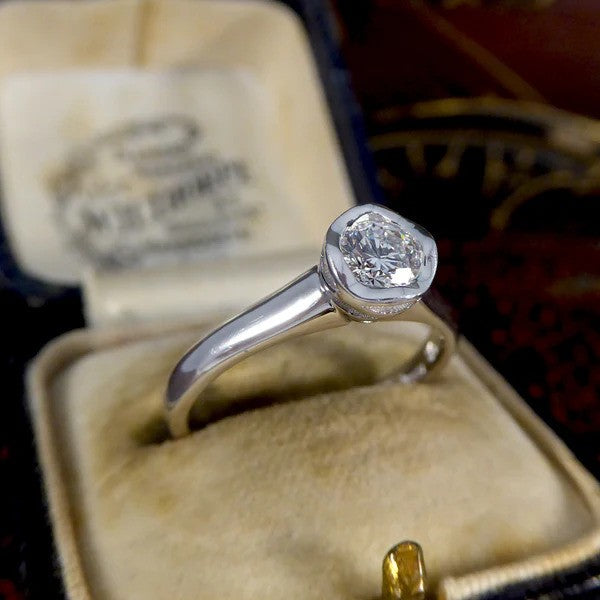 Diamond solitaire engagement ring in white gold.