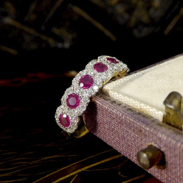 Ruby and diamond cluster ring in gold.