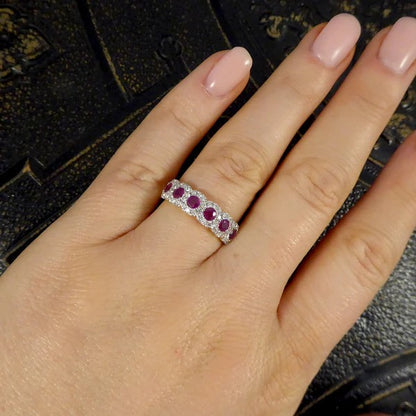 Ruby and diamond cluster ring in gold.