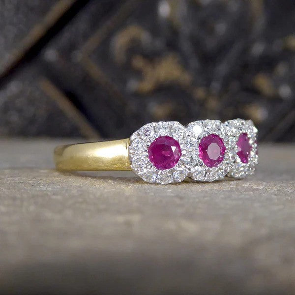 Ruby and diamond cluster ring in gold.