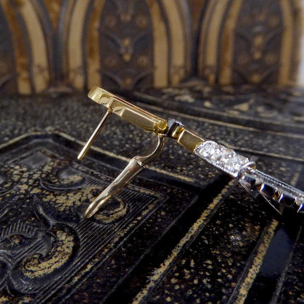 1940's drop earrings with diamonds set in platinum and rubies set in gold.