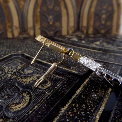 1940's drop earrings with diamonds set in platinum and rubies set in gold.