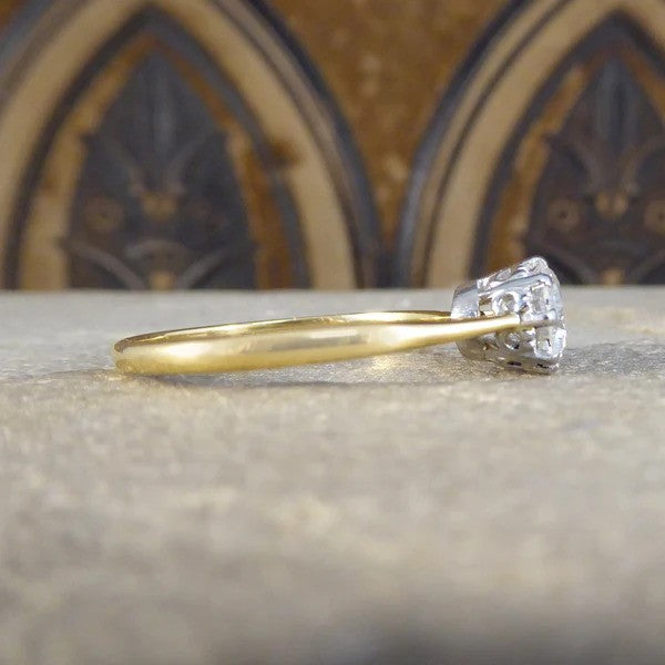 1920's 1.00 carat diamond solitaire engagement ring in gold and platinum.