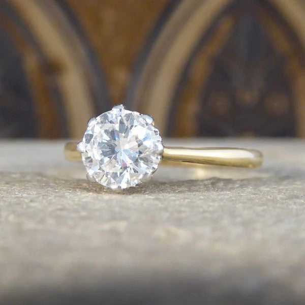1920's 1.00 carat diamond solitaire engagement ring in gold and platinum.