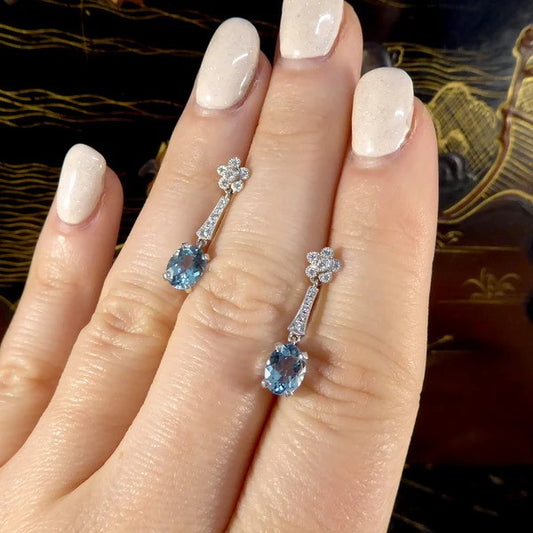 Diamond and aquamarine drop earrings in white gold