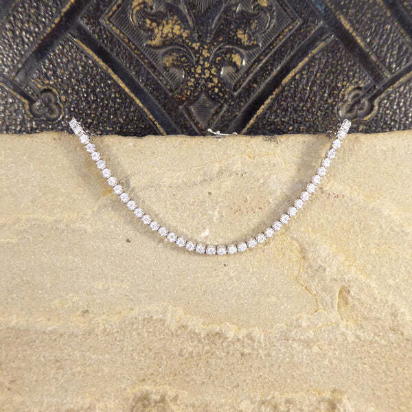Tennis bracelet in white gold set with diamonds.