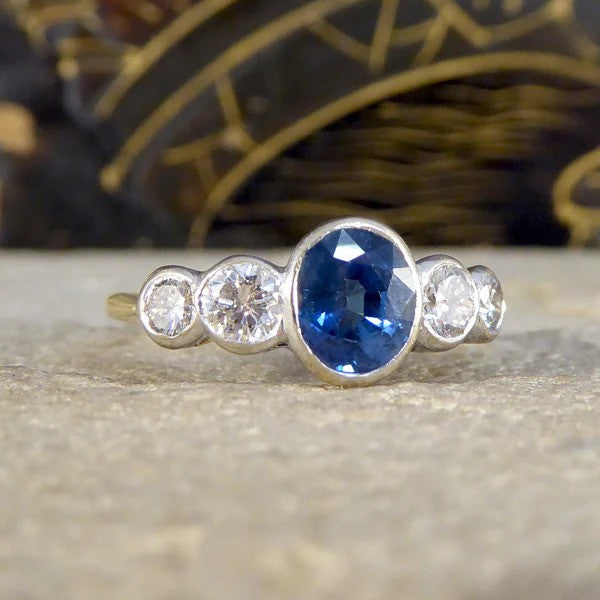 Edwardian sapphire and diamond five stone ring in white and yellow gold.