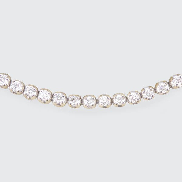 Flexi-link diamond tennis bracelet in white gold.