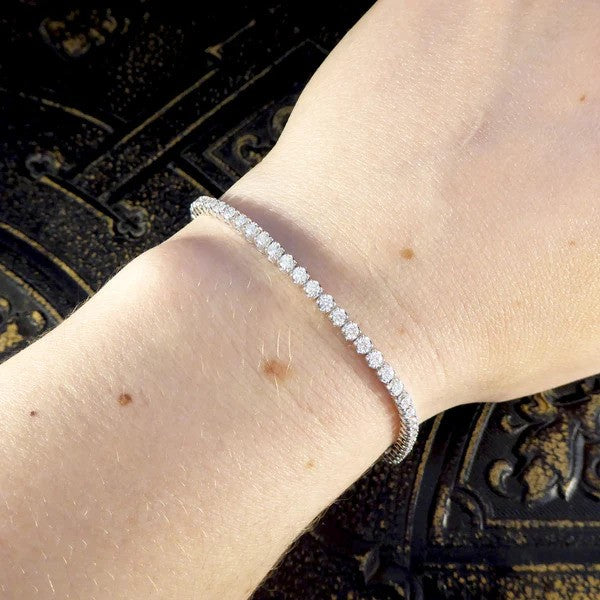 Flexi-link diamond tennis bracelet in white gold.