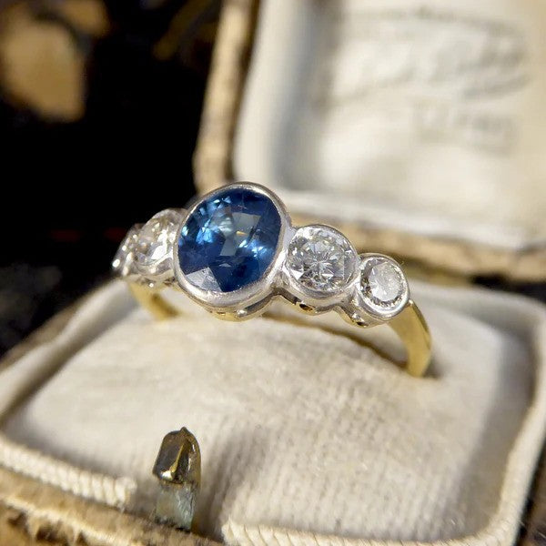 Edwardian sapphire and diamond five stone ring in white and yellow gold.