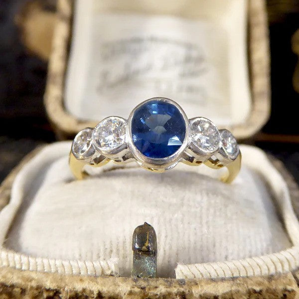Edwardian sapphire and diamond five stone ring in white and yellow gold.