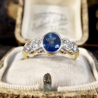 Edwardian sapphire and diamond five stone ring in white and yellow gold.
