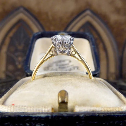 1920's 1.00 carat diamond solitaire engagement ring in gold and platinum.