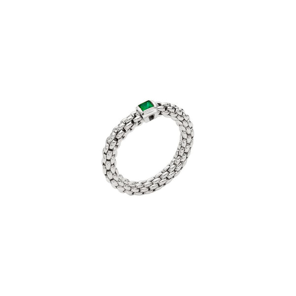 A white gold flexible ring set with a square cut emerald