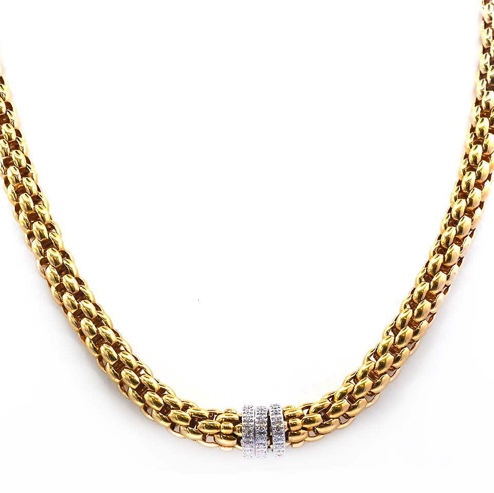 FOPE yellow gold rope necklace with three white gold diamond set rondels