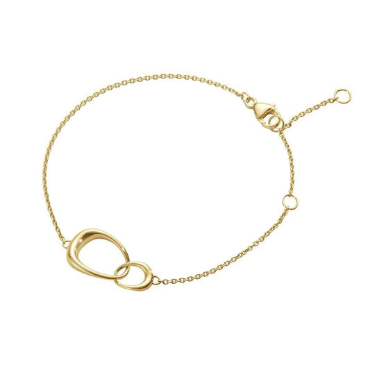 A yellow gold bracelet with interlocking feature links and a lobster clasp