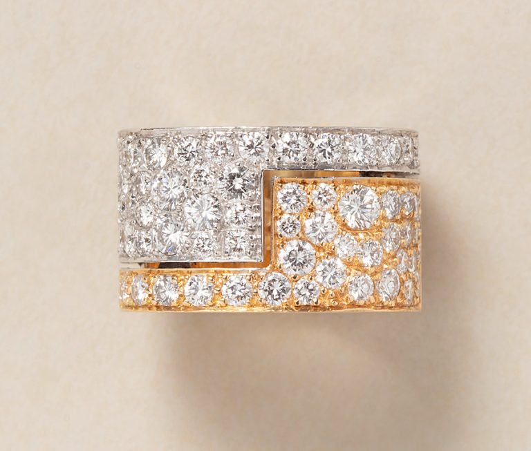 A vintage 18ct yellow and white gold diamond band ring