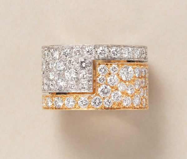 A vintage 18ct yellow and white gold diamond band ring