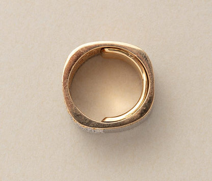 A vintage 18ct yellow and white gold diamond band ring