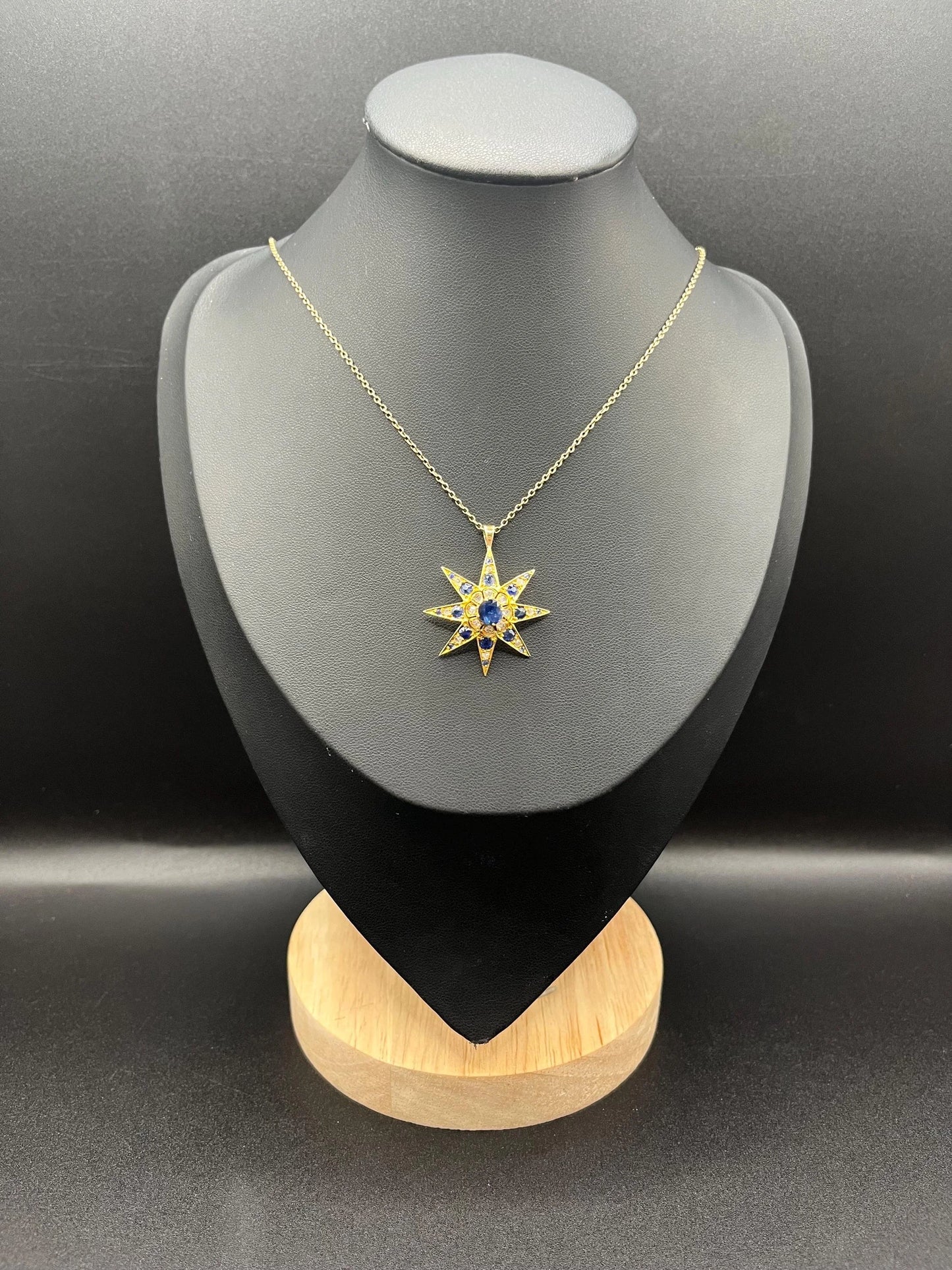 Edwardian 15 Carat Gold Sapphire and Diamond Starburst Pendant, Circa 1900