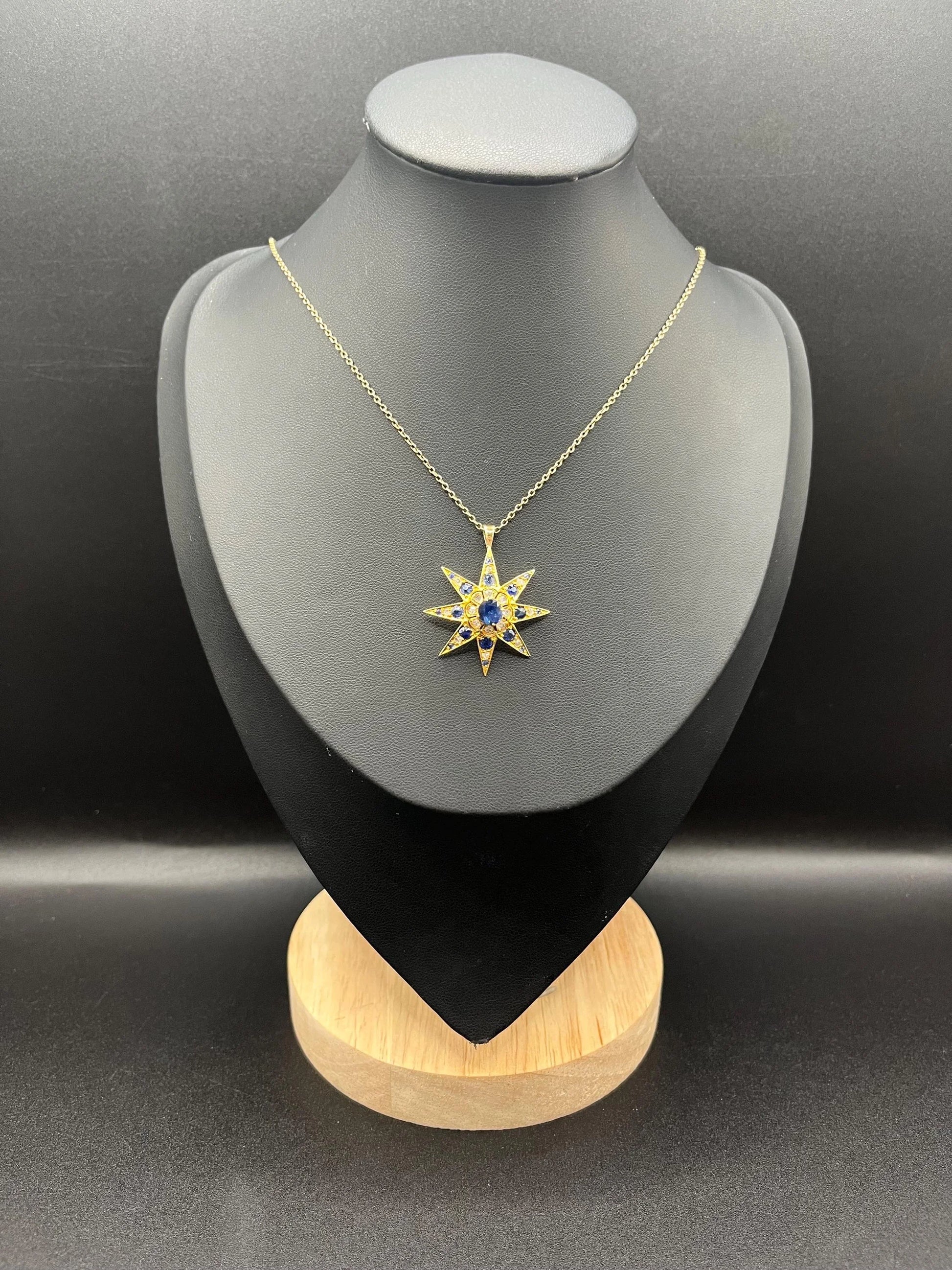 Edwardian 15 Carat Gold Sapphire and Diamond Starburst Pendant, Circa 1900
