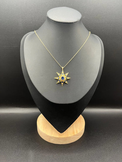 Edwardian 15 Carat Gold Sapphire and Diamond Starburst Pendant, Circa 1900