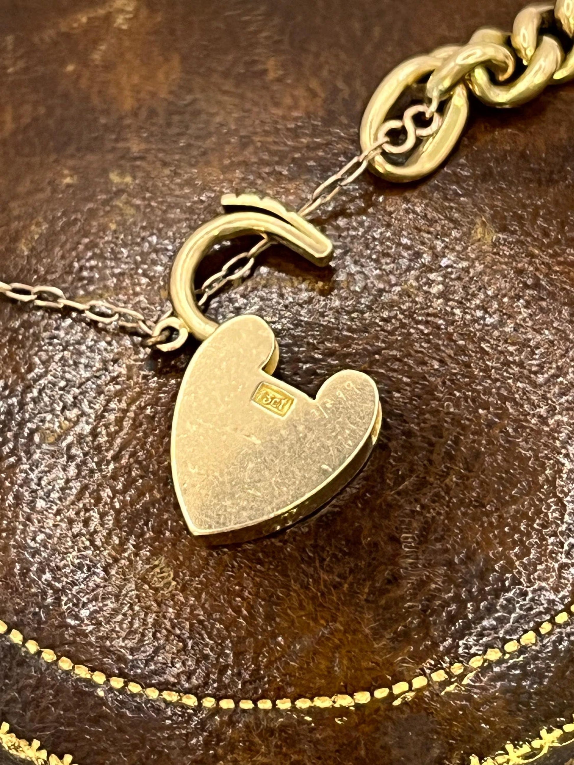 Victorian 15 Carat Rose Gold Curb Link Bracelet with Heart Padlock Clasp, Circa 1900