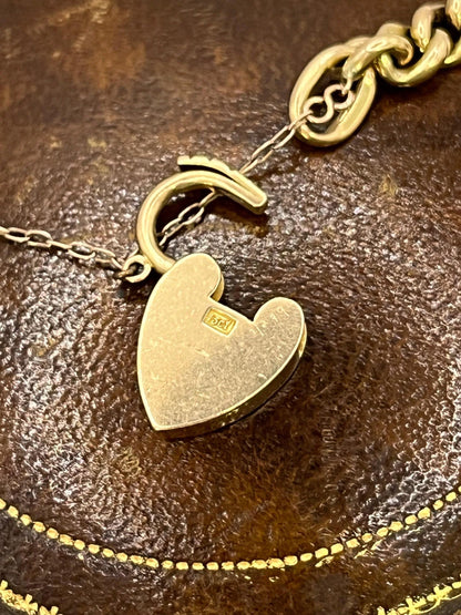 Victorian 15 Carat Rose Gold Curb Link Bracelet with Heart Padlock Clasp, Circa 1900