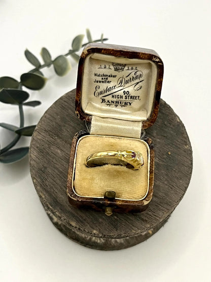 A yellow gold five stone acrostic multi-gemstone ring, in an antique ring box
