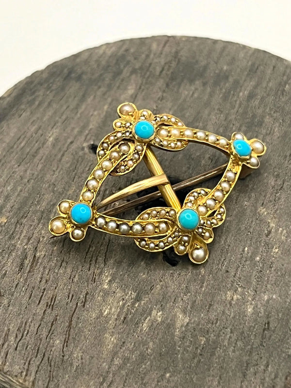 A yellow gold buckle style brooch/pendant with turquoise and seed pearls