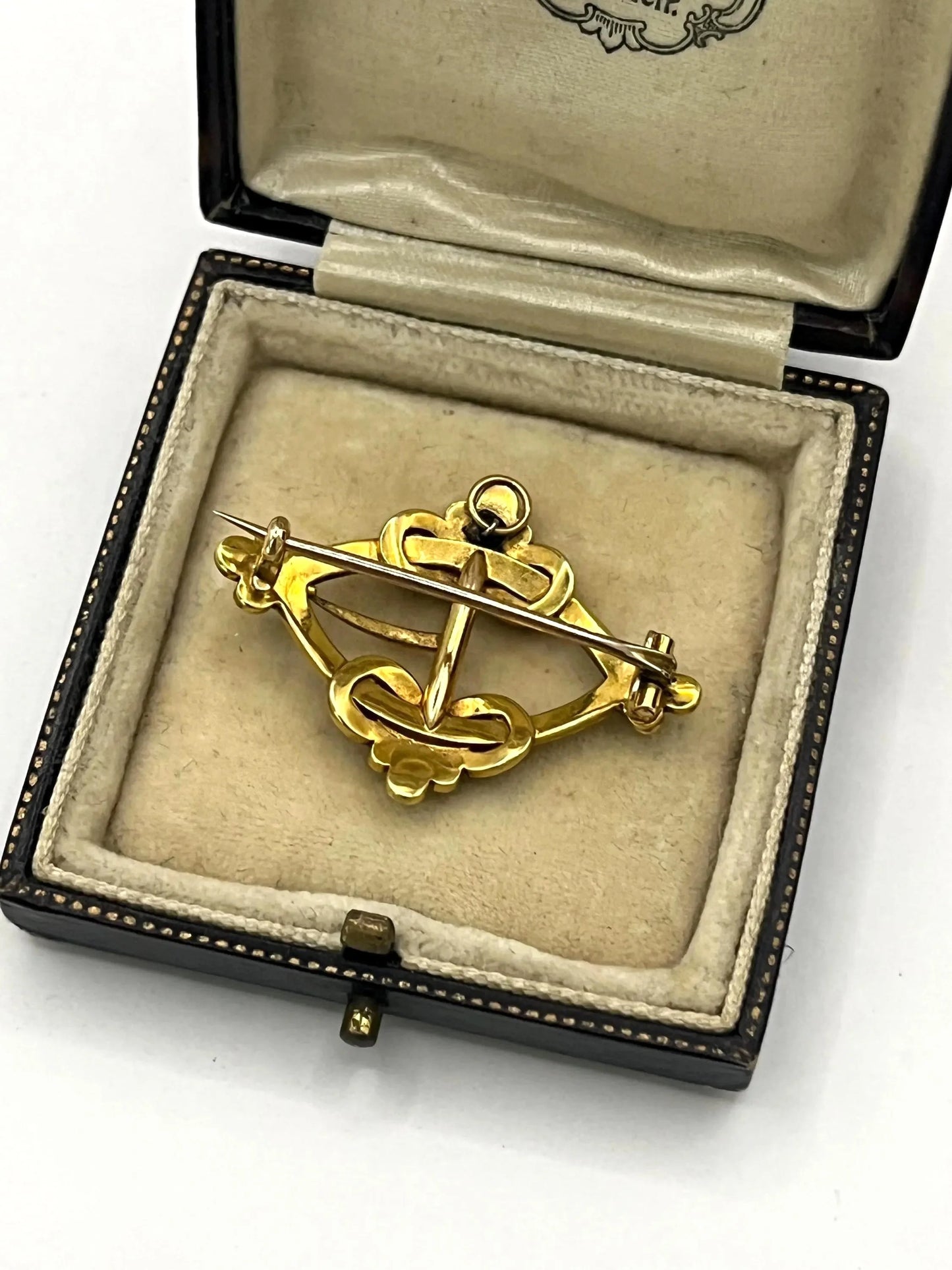 A yellow gold buckle style brooch/pendant with turquoise and seed pearls