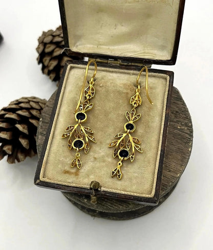 A pair of sapphire and diamond foliate drop earrings in yellow gold, in an antique box