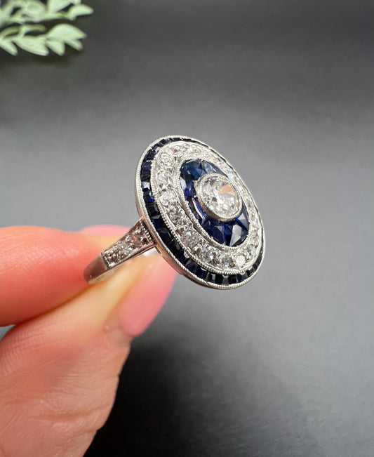 Antique Platinum, Edwardian era Sapphire & Diamond Oval Halo Cluster ring