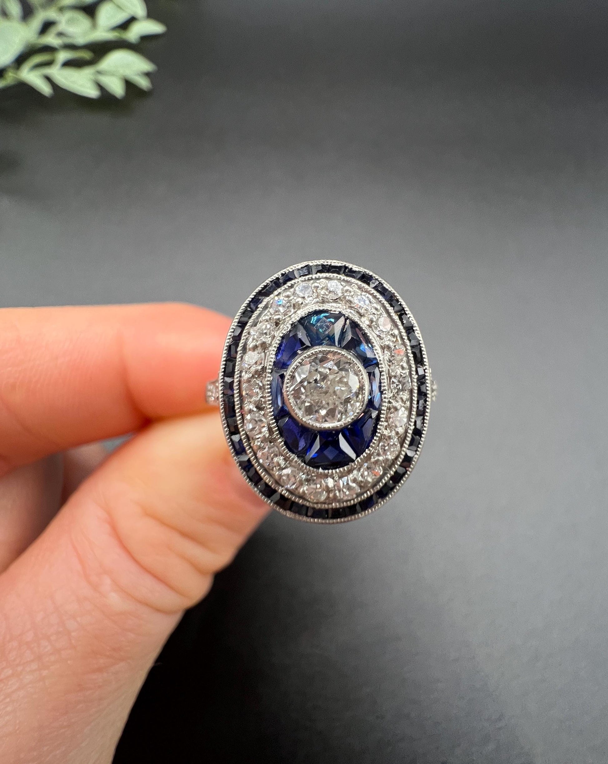 Antique Platinum, Edwardian era Sapphire & Diamond Oval Halo Cluster ring