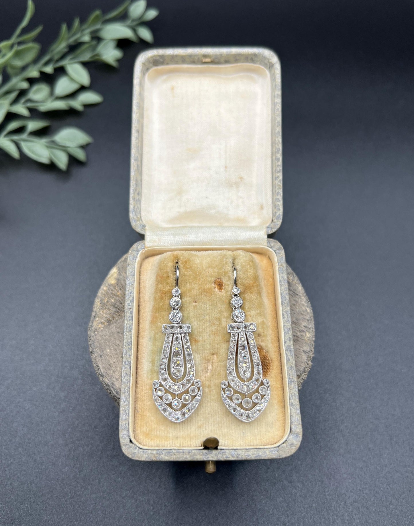 A pair of antique platinum diamond drop earrings, in a box