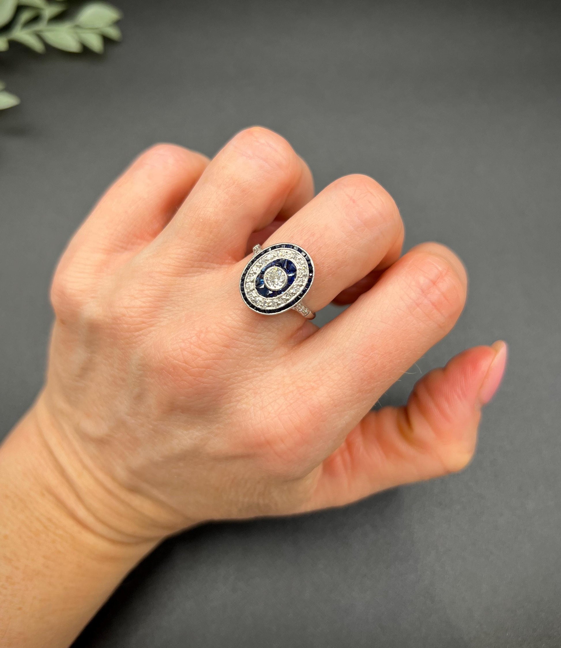 Antique Platinum, Edwardian era Sapphire & Diamond Oval Halo Cluster ring